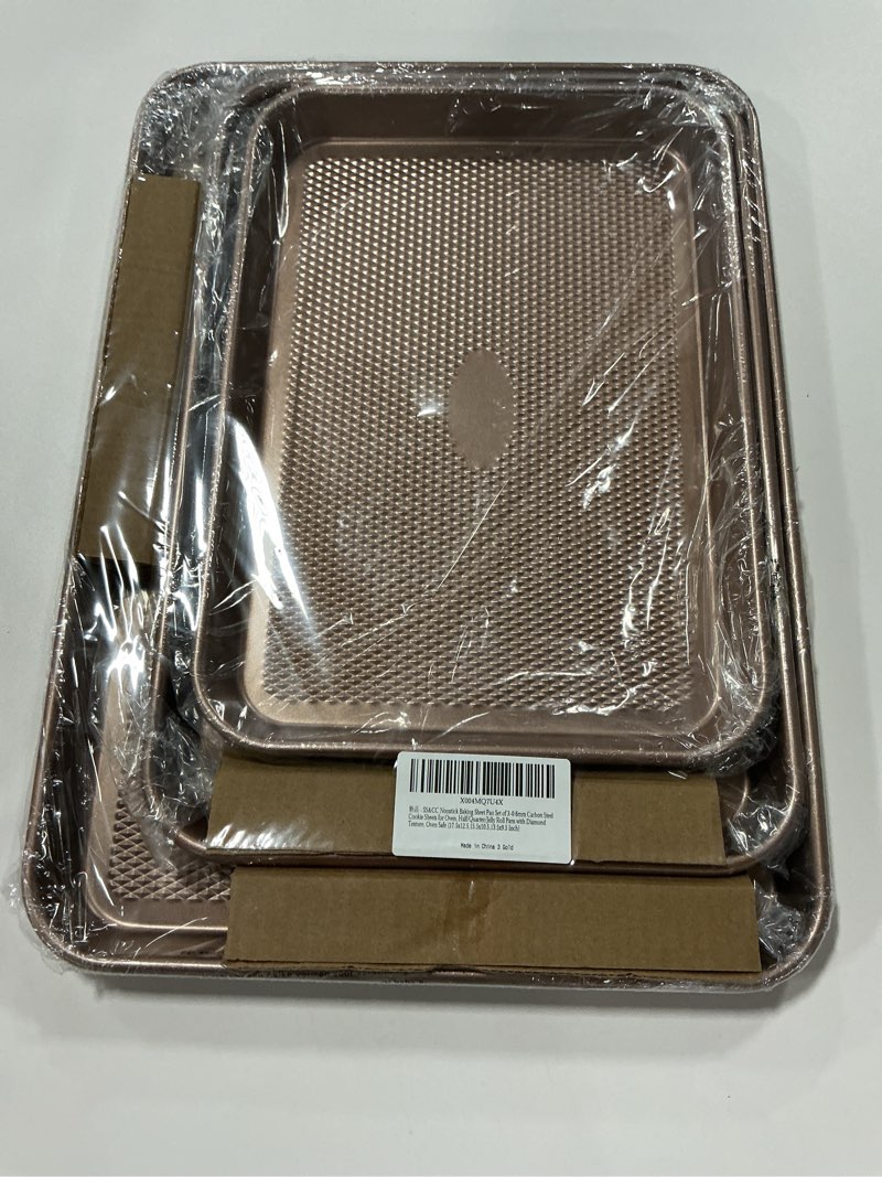 Condition photo showing New/Like New for SS&CC Nonstick Baking Sheet Pan Set of 3, 0.8mm Carbon Steel Cookie Sheets for Oven - Half/Quarter/Jelly Roll Pans with Diamond Texture, PFOA-Free & Oven Safe (17.5x12, 15.5x10.2, 13.5x9.5 Inch) Gold