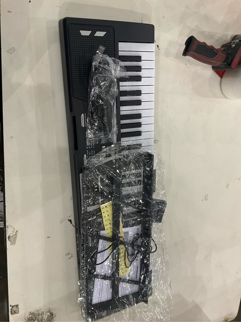 Condition photo showing New/Like New for 61 key piano keyboard - Electric Keyboard Piano with Microphone, Music Stand, Built-In Speakers - Portable Digital Piano for Beginners, Ideal Gift & Learning