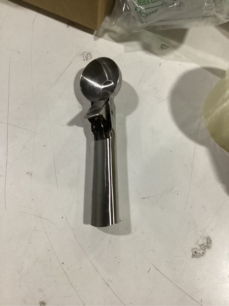 Condition photo showing Good Condition for old-school ice cream scoop with easy release - stainless steel, heavy duty durable design, ergonomic handle, perfect for ice cream, gelato, sundae, frozen yogurt, fruit, cookie(silver) (medium) medium (2oz)