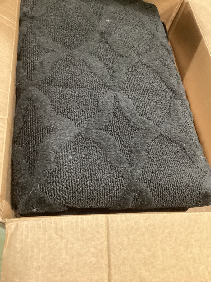 Condition photo showing Good Condition for garland rug sparta non slip polypropylene 5 ft. x 8 ft. black area rug- ideal for living rooms & hallways, stylish & durable for high-traffic areas black 5' x 8' (rectangular)