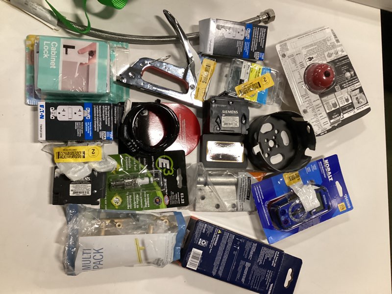 Condition photo showing As Is for Assorted Small Miscellaneous Home items Including Wall Plugs, Cabinet Locks, Etc.  Multiple Pieces, (variety of items)