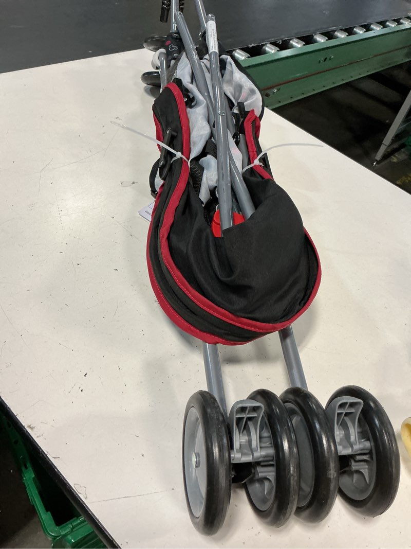Condition photo showing As Is for disney baby us136hdd comfort height character umbrella stroller with basket,