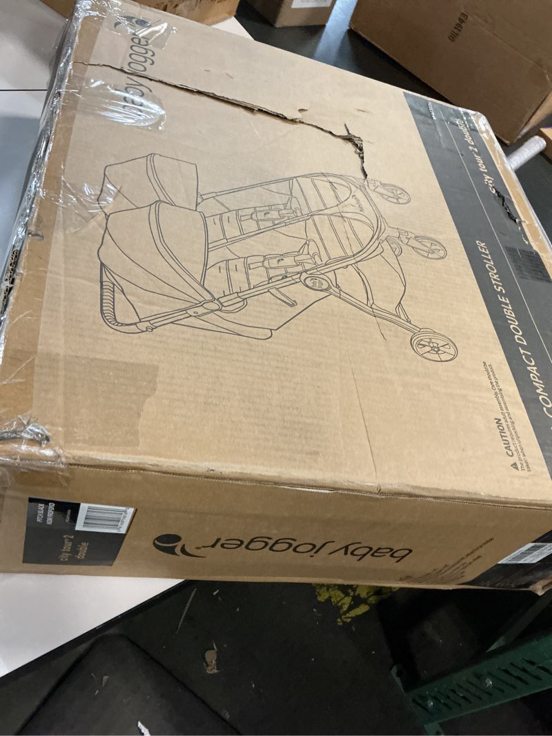 Condition photo showing New/Like New for Baby Jogger City Tour 2 Double Stroller Compact & Sleek Twin Design with Easy-To-Maneuver Features Ideal for Growing Kids Plush Imported Double Stroller Pitch Black