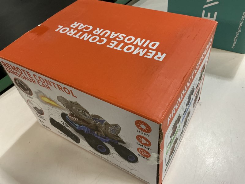 Condition photo showing New/Like New for Remote Control Dinosaur Car for Boys Kids, 2.4Ghz RC Dinosaur Truck for Toddlers, Electric Hobby RC Car Toys with Light & Sound Spray Christmas Birthday for 3 4 5 6 7 8 Year olds Kids Boys 301-22