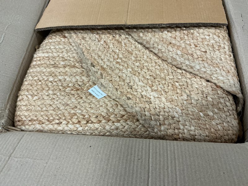 Condition photo showing As Is for KEMA Natural 8ft Jute Braided Round Area Rug,Handmade Reversible Boho Farmhouse Rug, Rustic Vintage Handwoven Carpet for Living Room, Bedroom, Entryway & Kitchen 8' (Round) Braided Rug