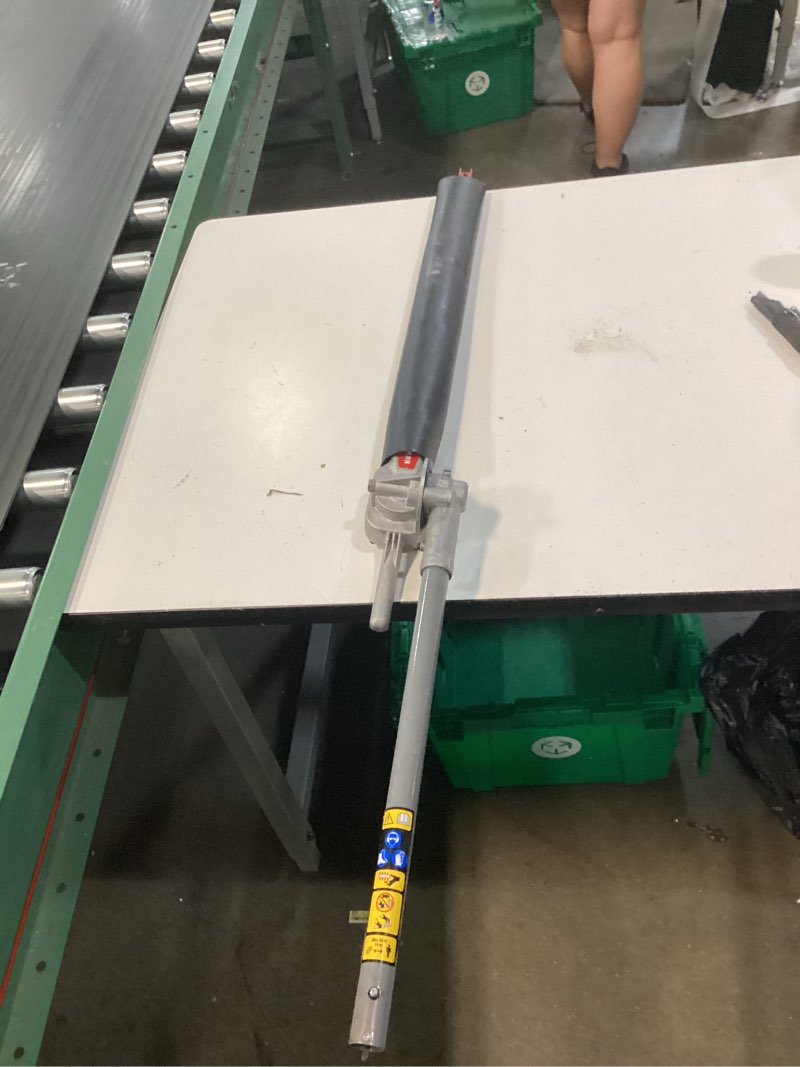 Condition photo showing As Is for this craftsman hedge trimmer attachment features a long red blade and a gear box for articulating