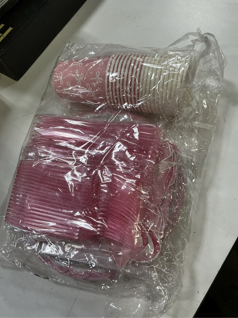 Condition photo showing Good Condition for pink bow birthday decorations include plates, napkins, cups, cutlery, banner, hanging swirls, cake & cupcake toppers, balloons, tablecloths for coquette birthday decorations, serves 20