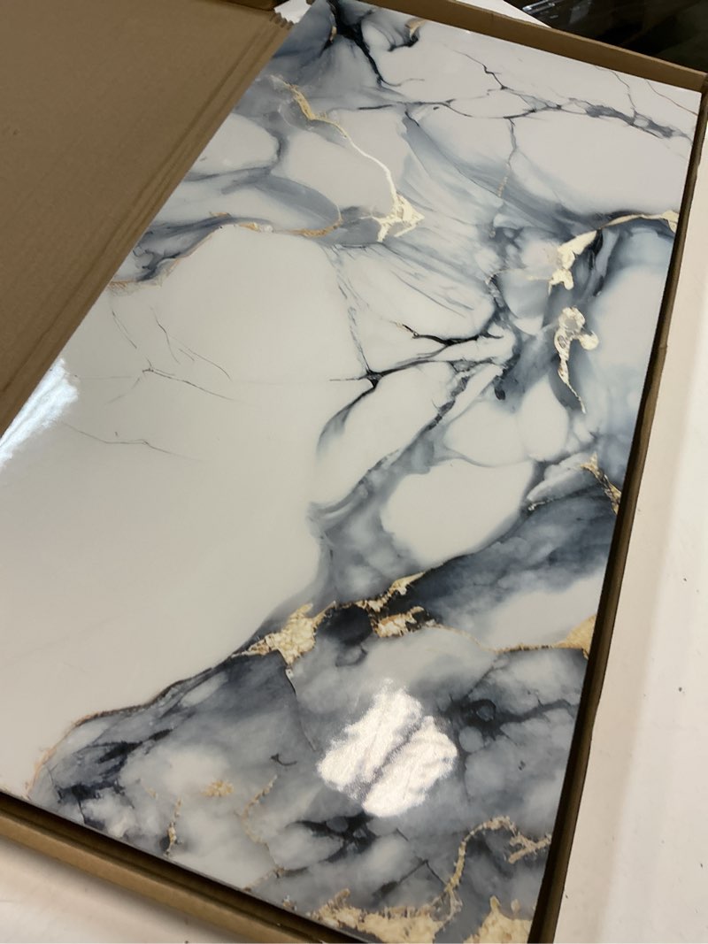 Condition photo showing Good Condition for 10pcs thick marble peel and stick waterproof wall panels,heat-resistant backsplash tile, 23.6"x11.8" pvc foam wall sticker for kitchen,living rooms,tv walls,blue and gold (not real tile 19.4sq. ft.) blue marble tiles 23.6" x 11.8" x 4mm x 10pack
