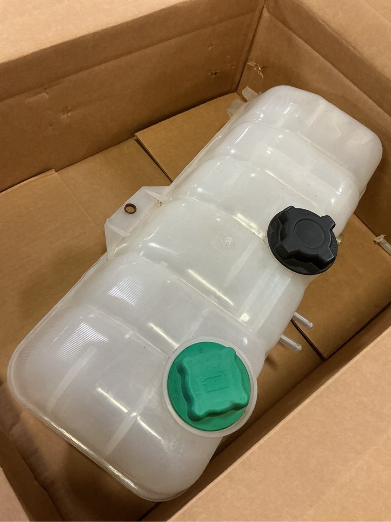 Condition photo showing As Is for dorman 603-5507 front engine coolant reservoir compatible with select volvo models