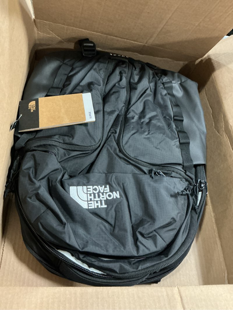 Condition photo showing New/Like New for the north face surge commuter laptop backpack | daypack with water repellent finish, 16" laptop sleeve, reflective details one size tnf black/tnf black-npf