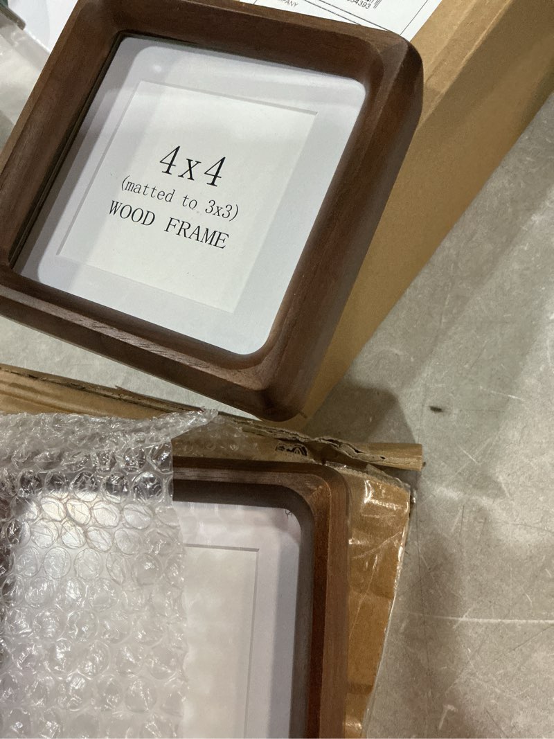 Condition photo showing Good Condition for helplex 4x4 matted to 3x3 square picture frame set of 2 - natural walnut wood with hd tempered glass, convertible design for wall or tabletop display - art gallery & luxury home office decor walnut 4x4 matted to 3x3