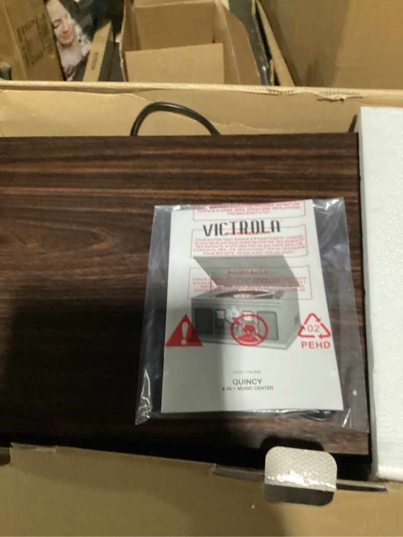 Condition photo showing New/Like New for Victrola The Quincy 6-in-1 Bluetooth Record Player & Multimedia Center with Built-in Speakers – 3-Speed Turntable, CD & Cassette Player, AM/FM Radio, Wireless Music Streaming (Espresso) Espresso Record Player