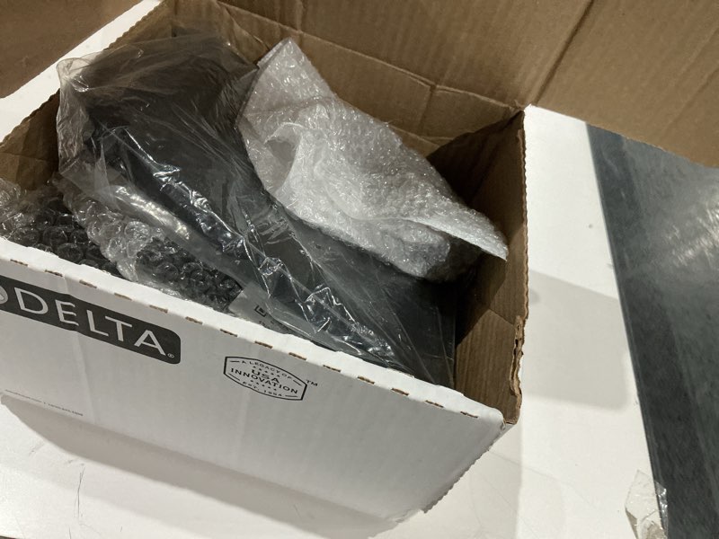 Condition photo showing As Is for delta modern 14 series square bathtub and shower faucet set, matte black shower head and handle set, valve trim kit, matte black t14467-bl-pp (valve not included) matte black standard shower head