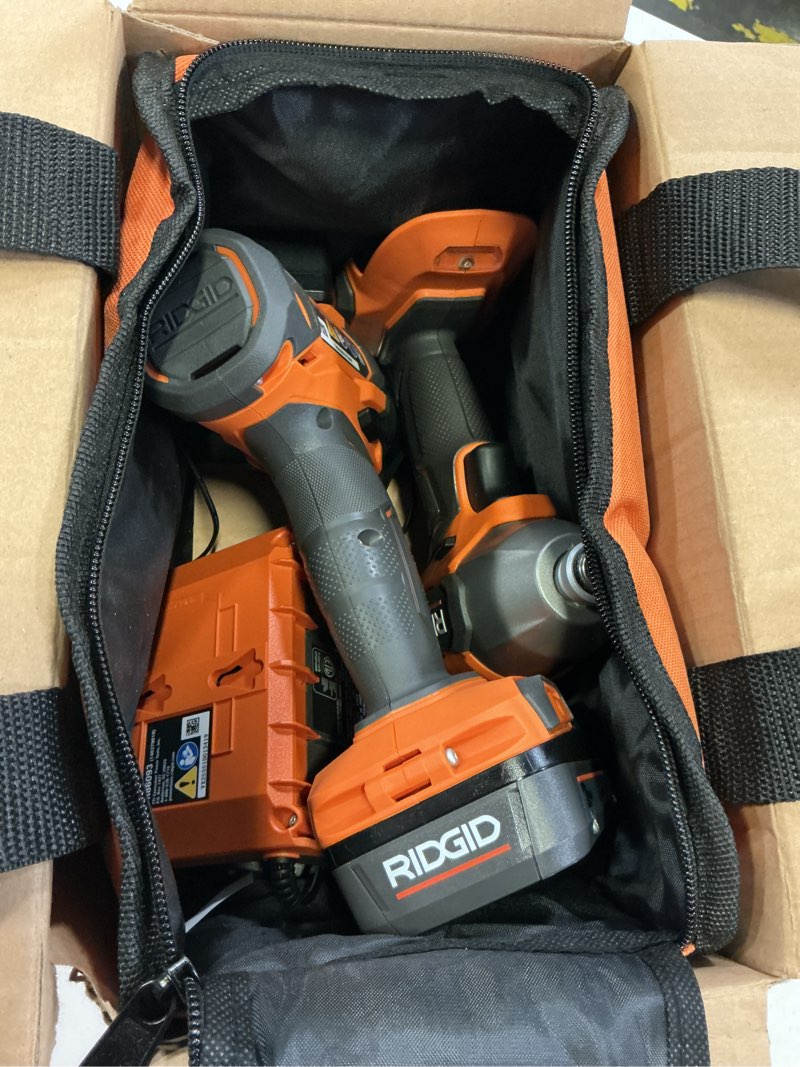 Condition photo showing Good Condition for ridgid 18v cordless 2-tool combo kit with drill/driver, impact driver, (2) 2.0 ah batteries, and charger