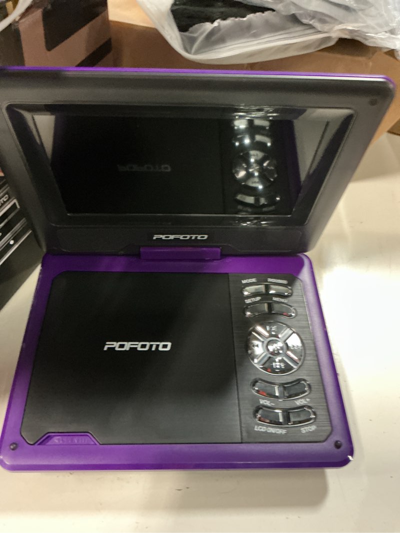 Condition photo showing Good Condition for pofoto 9.5" portable dvd player for kids and car with 7.5" swivel screen, 4-6 hours working time, car dvd player with dual speakers, remote control, support sync tv, region free usb/sd/av - purple