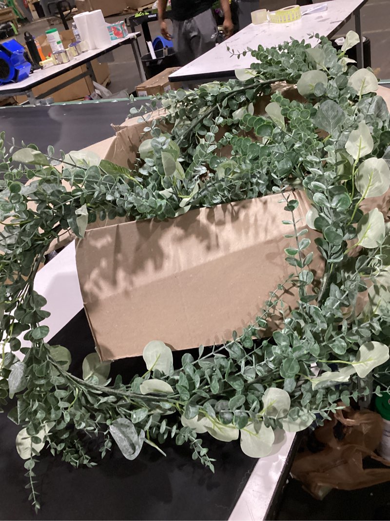 Condition photo showing Good Condition for long faux eucalyptus greenery garland - silver dollar eucalyptus for wedding arch, swag, backdrop, doorways, mantel, table runner - indoor/outdoor