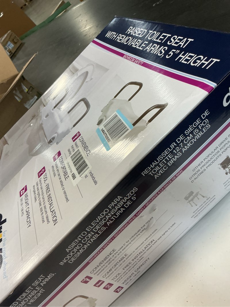 Condition photo showing New/Like New for Drive Medical RTL12027RA 2-in-1 Raised Toilet Seat with Removable Padded Arms, Standard Seat