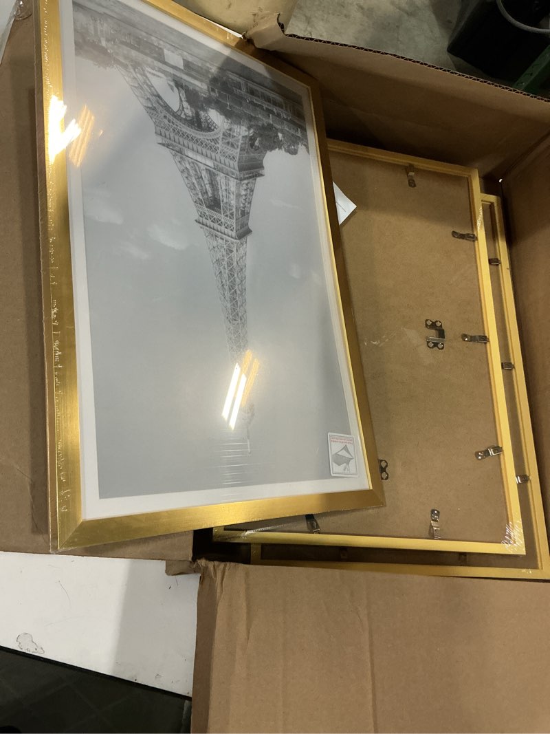 Condition photo showing As Is for (incomplete, only 3 pack) upsimples 12x18 picture frame set of 5, display pictures 11x17 with mat or 12 x 18 without, wall gallery poster frames, gold gold 12x18