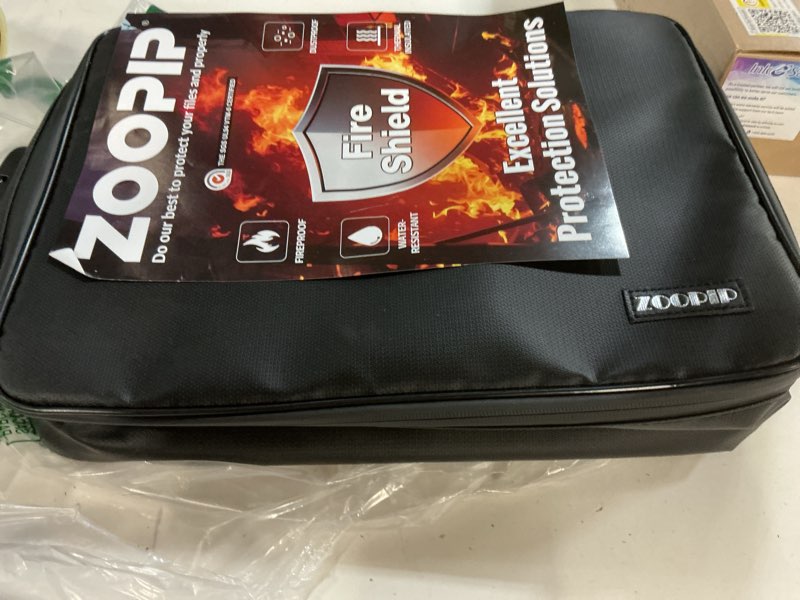 Condition photo showing New/Like New for zoopip fireproof document bag with lock,soft-shell document organizer with water-resistant zipper,po