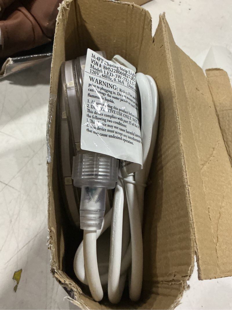 Condition photo showing As Is for better homes & gardens color chasing strip light 16.4 ft