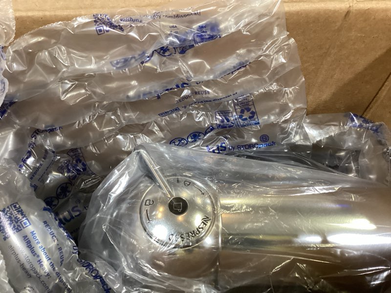 Condition photo showing New/Like New for nespresso vertuo coffee and espresso maker by breville, chrome machine chrome