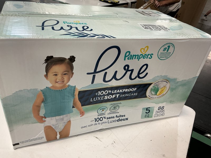 Condition photo showing New/Like New for pampers pure protection diapers pack - size 5 - 88ct: 27+ lbs, wetness indicator, hypoallergenic, chlorine-free