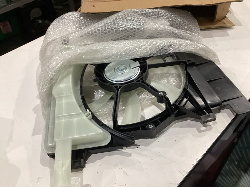 Condition photo showing As Is for gxywady radiator fan to3115145 1636121090 replacement for 2006-2015 yaris 1.5l, 2008-2014 scion xd 1.8l