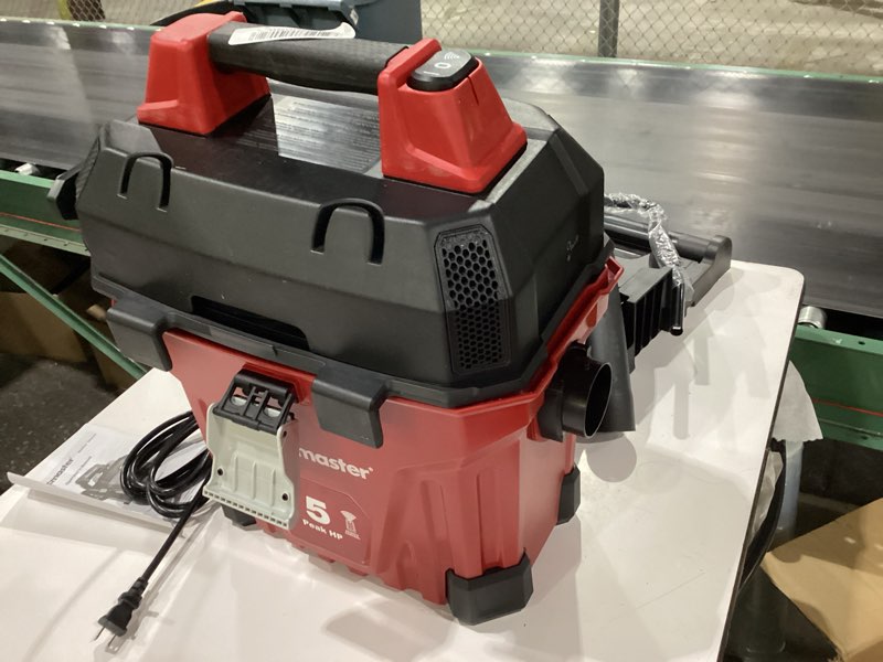 Condition photo showing Good Condition for *not tested*  vacmaster 5-gallon* 5 peak hp† remote control wall mount wet/dry vac – vwmb508 1101 5 gallon