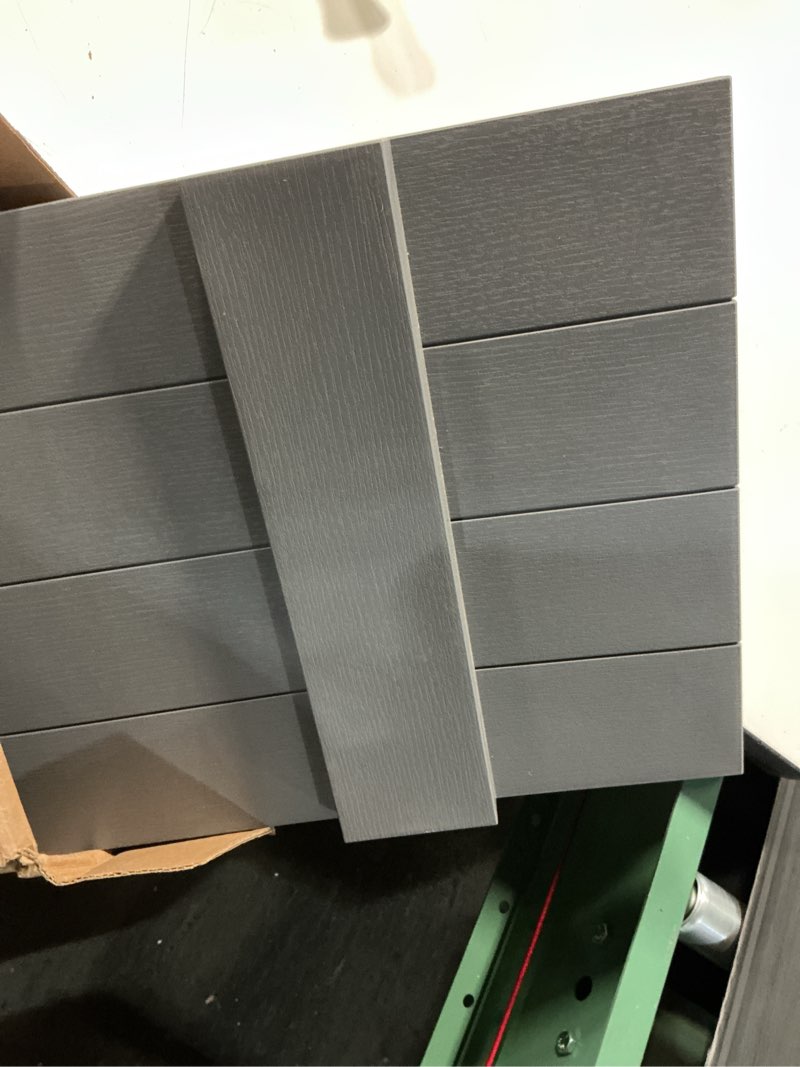 Condition photo showing As Is for 14 in. w x 47 in. h vinyl exterior joined board and batten shutters pair in tuxedo grey