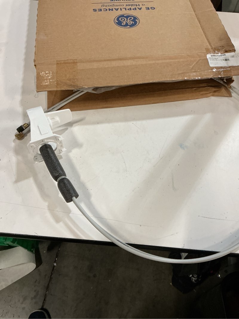 Condition photo showing Good Condition for GE Refrigerator Water Filter Manifold - OEM Replacement (WR02X45206)