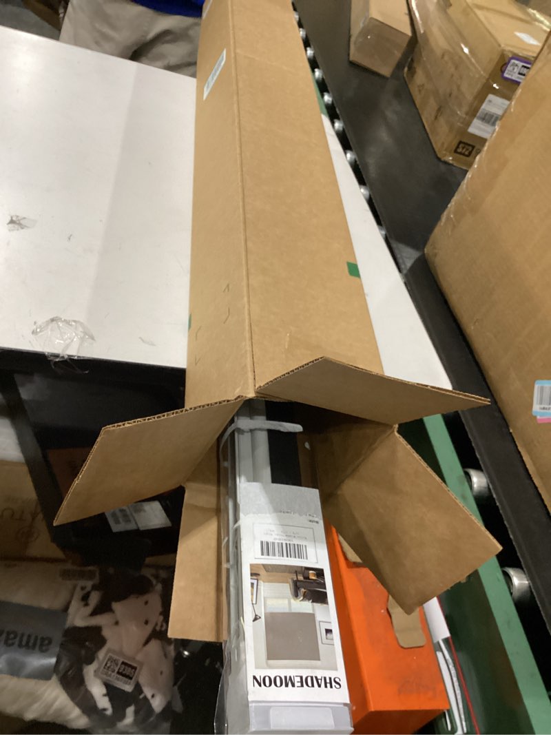 Condition photo showing Good Condition for shademoon blackout cordless roller shades for indoor windows,room darkening blind with spring system pull down,thermal insulated uv block fabric,home office (100% blackout, black,41" w x 72" h) r-black 41"w x 72"h