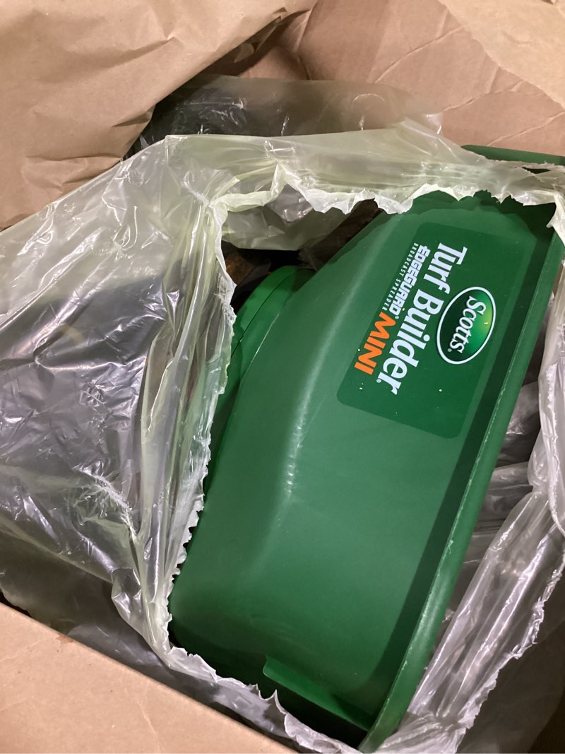 Condition photo showing Good Condition for scotts turf builder edgeguard mini broadcast spreader for seed, weed and feed, fertilizer, salt, ice melt, push spreader holds up to 5,000 sq.ft. product