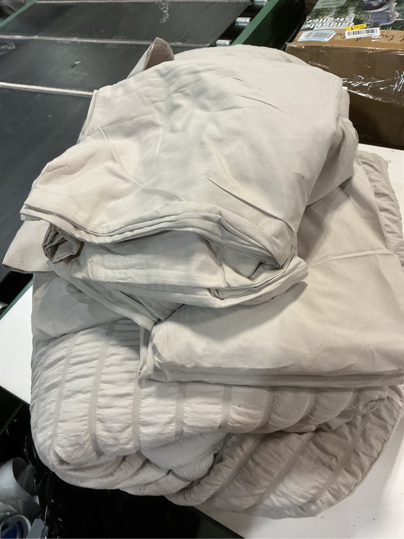 Condition photo showing As Is for CozyLux Oversized King Comforter Set Beige Seersucker 7 Pieces 120x98 Bed in a Bag Comforter Set with Sheets, Luxury Soft Bedding Sets with Down Alternative Comforter, Sheets, Pillowcases & Shams Beige Oversized King