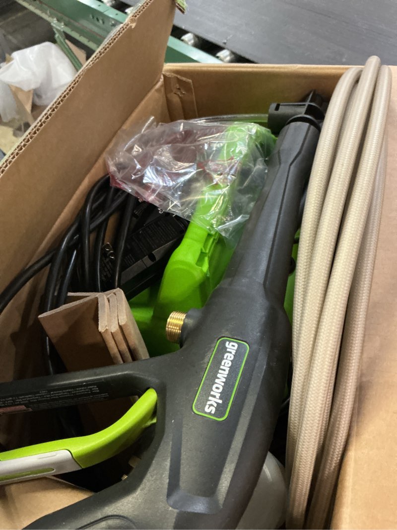 Condition photo showing As Is for greenworks 1800 psi 1.2-gpm cold water electric pressure washer with 2 spray tips