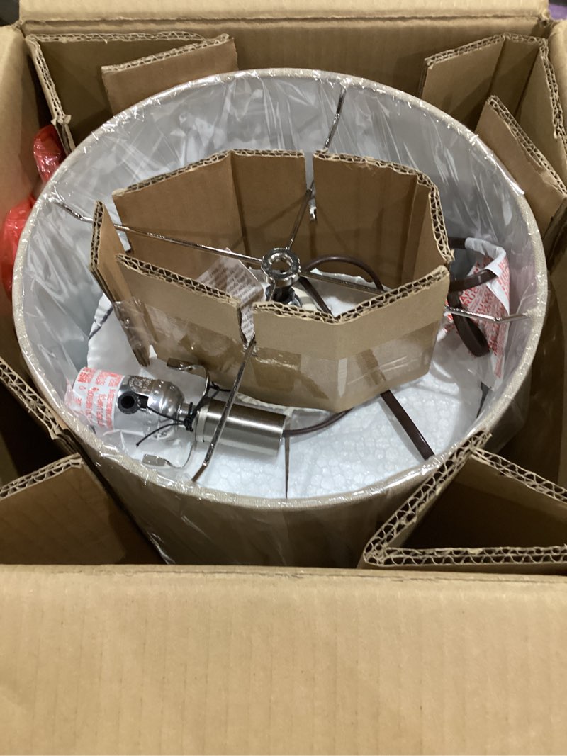 Condition photo showing New/Like New for signature design by ashley rainermen casual ceramic table lamp, transparent white glaze finish, drum hardback fabric shade, 11" w x 11" d x 21" h, off white off-white