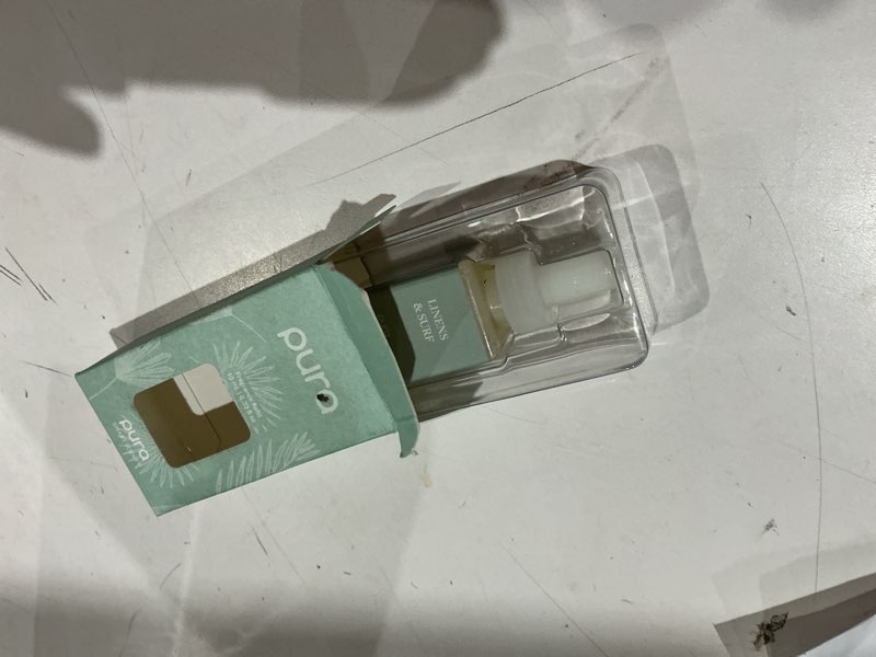 Condition photo showing Good Condition for pura fragrance refill  linens & surf