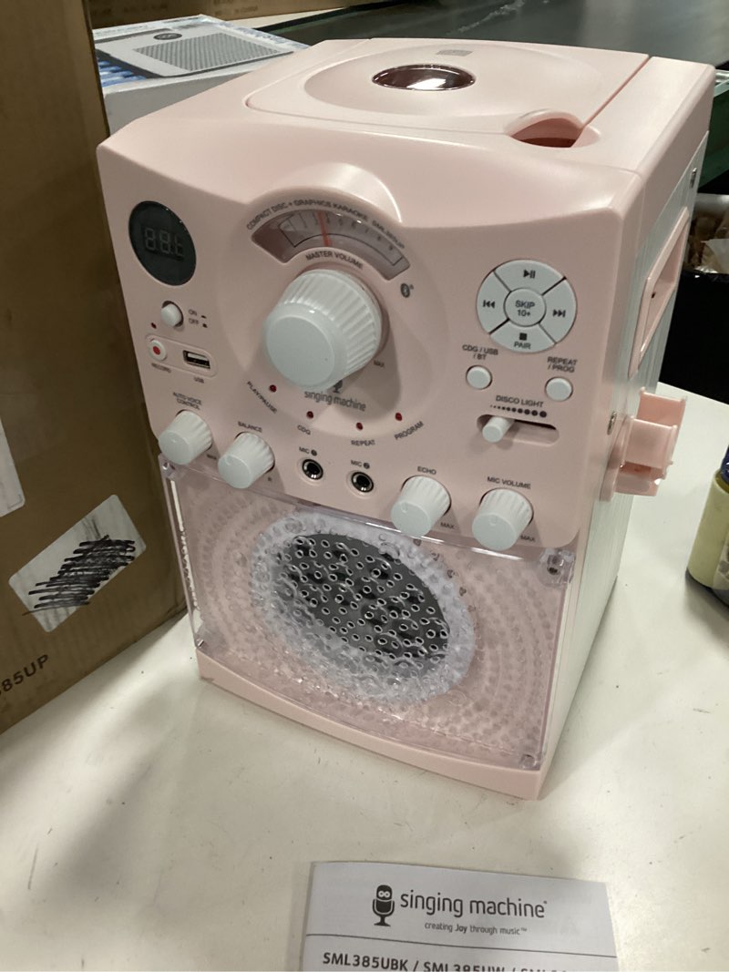 Condition photo showing Good Condition for Singing Machine Portable Karaoke Machine for Adults & Kids with Wired Microphone, Rose Gold/Frosted Pink - Built-In Karaoke Speaker, Bluetooth with LED Disco Lights - Karaoke System with CD+G & USB Pink Home Karaoke