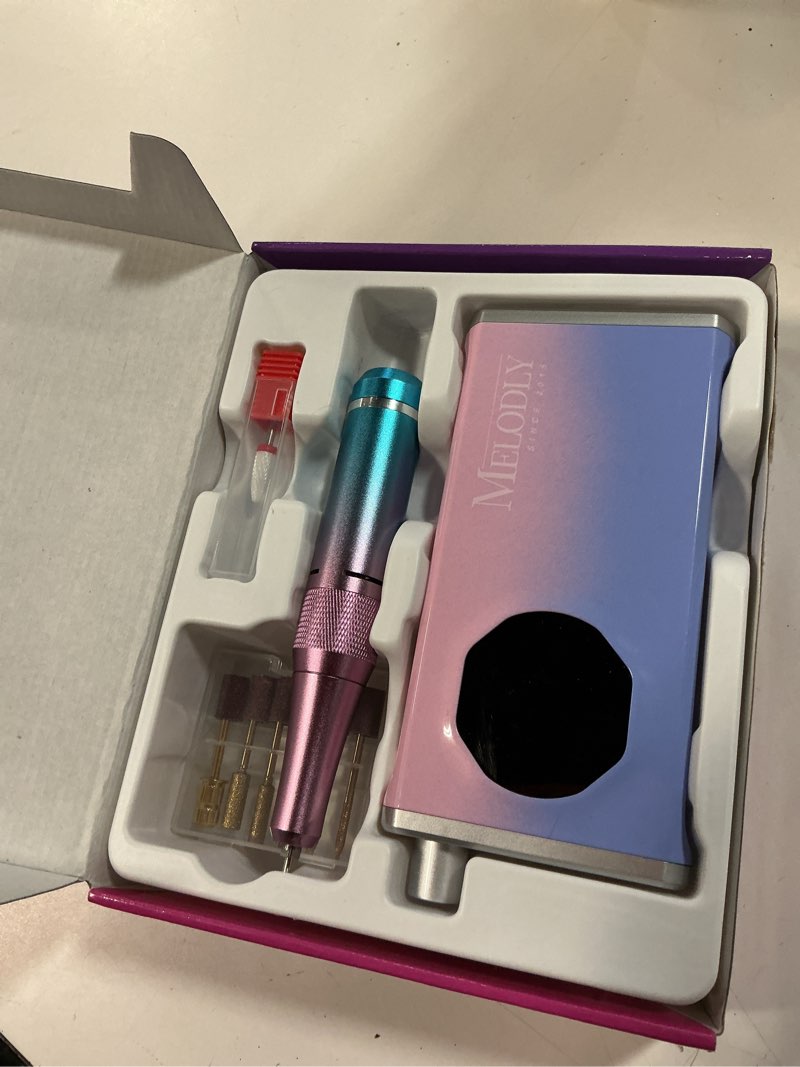 Condition photo showing Good Condition for Electric Nail Drill File Professional 40000 RPM, Melodly Rechargeable Electric Nail File Machine Kit for Acrylic Gel Nails Polishing Removing, Portable Cordless Efile with Gold Bits Kit at Salon Home Pink-blue