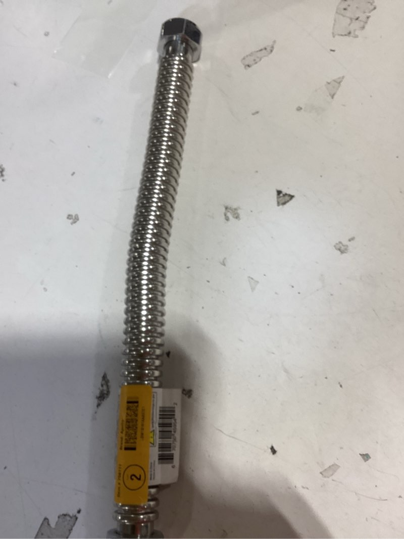 Condition photo showing As Is for apollo 18-in 1-in -in fip inlet x 1-in -in fip outlet stainless steel water heater connector