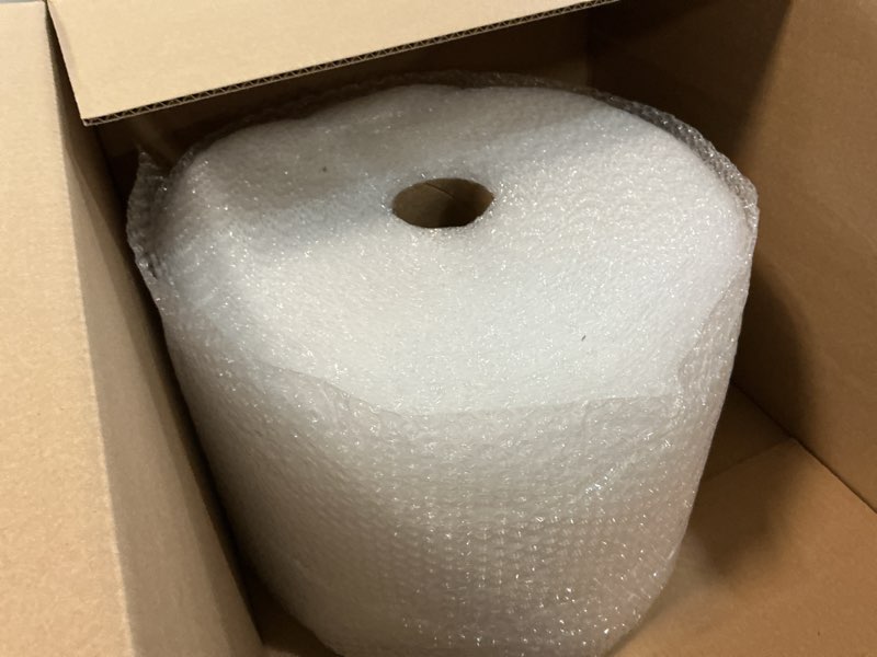 Condition photo showing New/Like New for Amazon Basics Bubble Wrap for Moving, Packing, Shipping and Storage, Perforated Protective Cushioning for Fragile Items, 12-inch x 175-ft Long Roll, Small 3/16", Clear Clear 12 inch x 175 ft