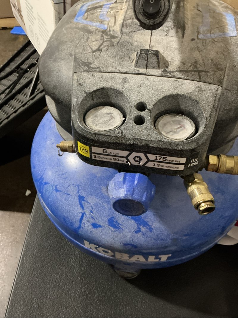 Condition photo showing As Is for kobalt 6-gallon portable electric 150 psi pancake air compressor