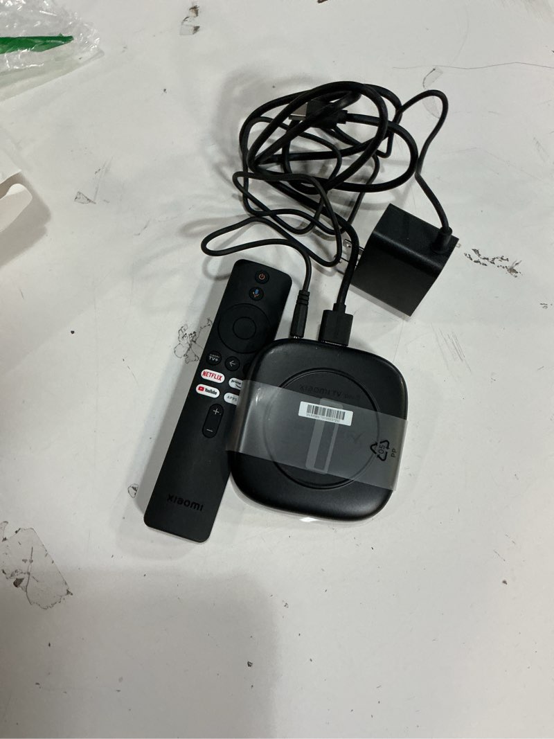 Condition photo showing As Is for Xiaomi Android TV Box S 3rd Gen, 4K UHD Google TV Box Dolby Vision Atmos & DTS:X, 2GB + 32GB Storage WiFi 6 HDMI 2.1 360° Bluetooth Remote Voice Control for Television Internet Streaming Connection