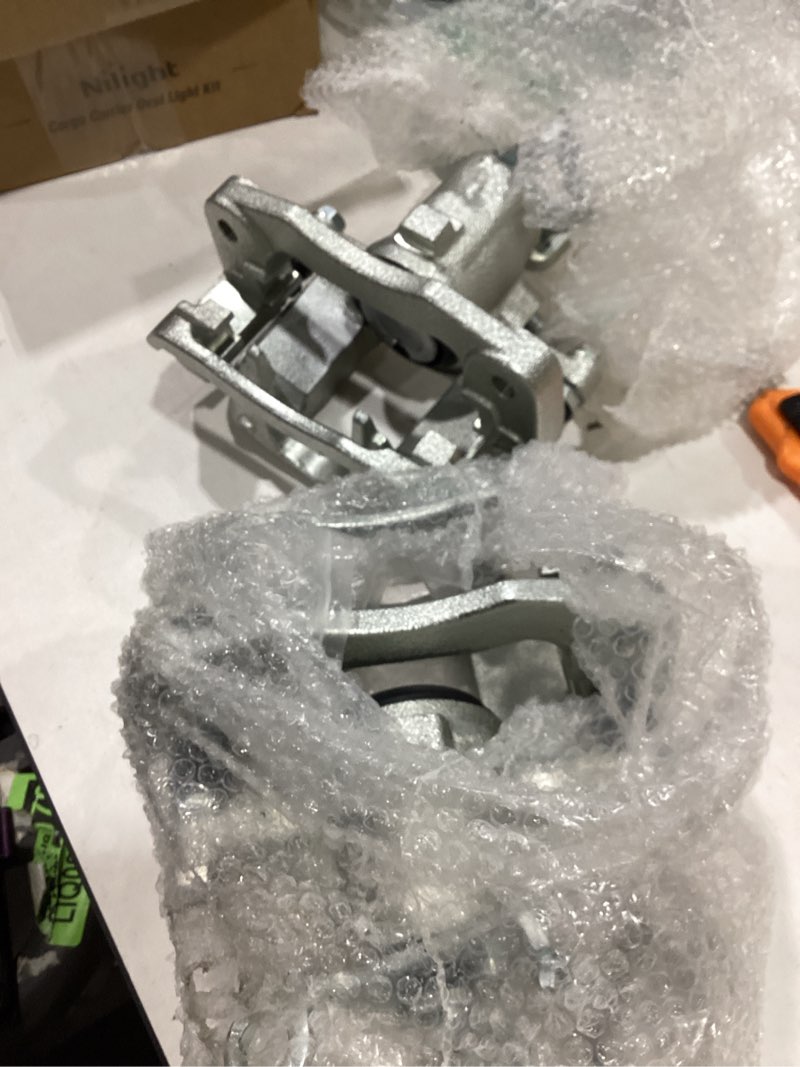 Condition photo showing New/Like New for brake caliper compatible with select dodge, chrysler, and plymouth models - intrepid, grand caravan, town & country, voyager, prowler, new yorker, front side,18-4642 18-4643 front-18-4642 & 18-4643