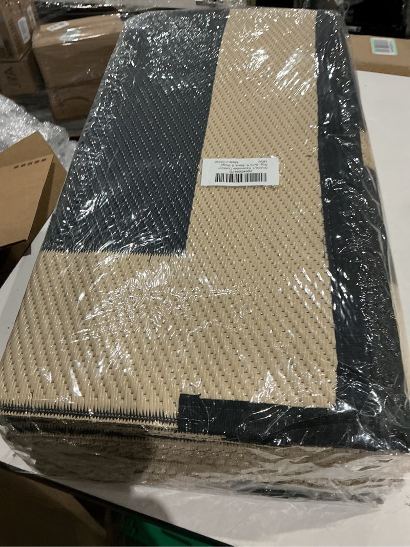 Condition photo showing Good Condition for olanly outdoor rug 8x10 ft waterproof, reversible outdoor plastic straw rug, rv mat, indoor outdoor carpet clearance for patio, camping, balcony, deck, backyard, black & beige 8' x 10' black & beige