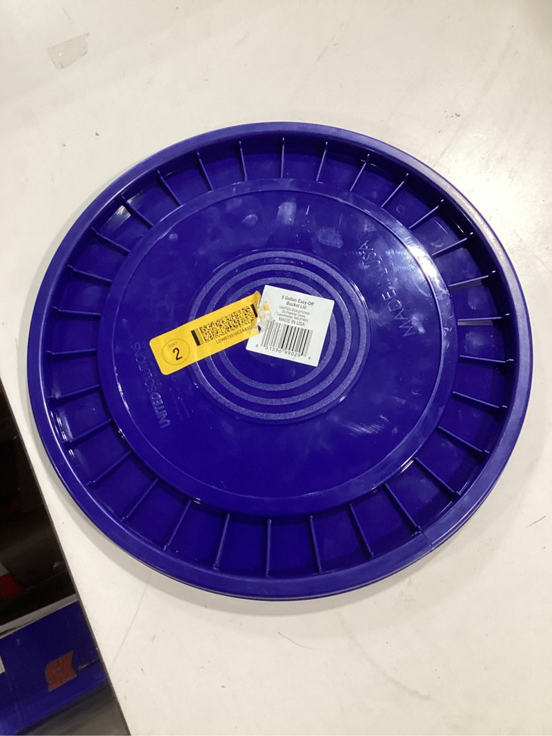 Condition photo showing Good Condition for united solutions 5-gallon blue plastic bucket lid
