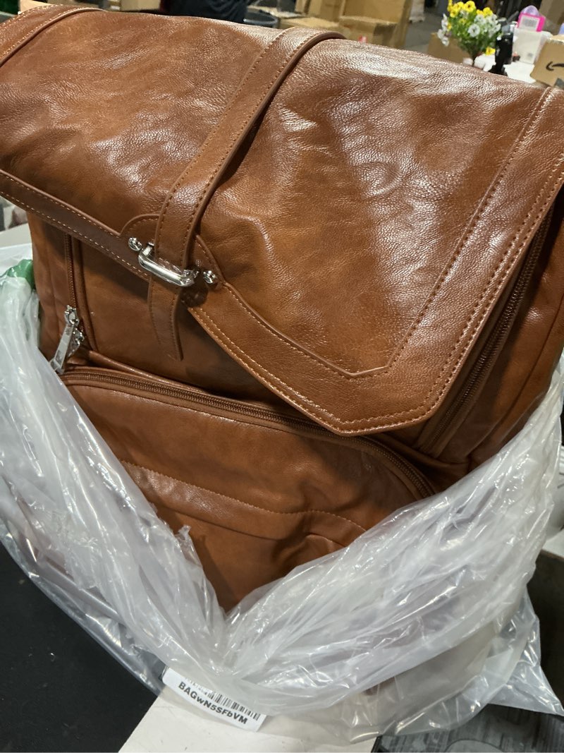Condition photo showing Good Condition for citi collective navigator saddle brown diaper bag backpack -premium vegan leather- compact spacious design with insulated pockets and stroller clips