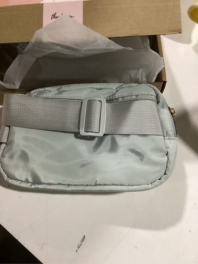 Condition photo showing As Is for Fanny Packs for Women and Men, Waterproof Waist Belt Bag With Adjustable Strap for Workout Traveling Hiking Running Light Grey, YDYB101 Light Grey 1 Pack Fanny Pack