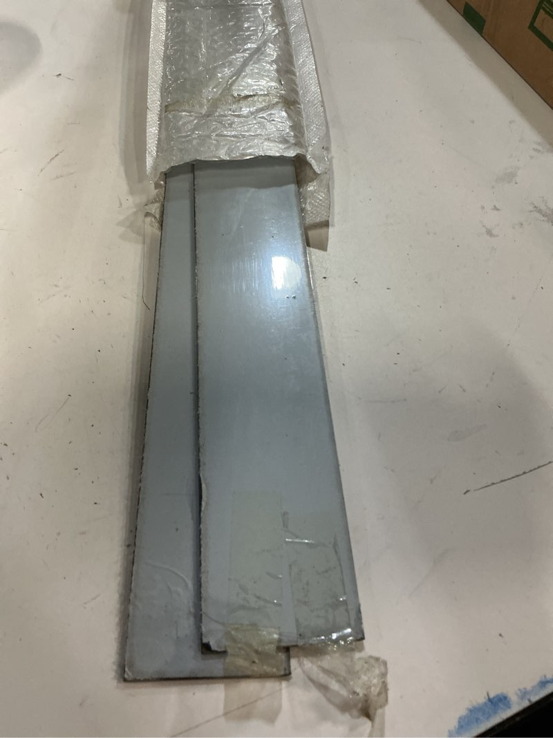 Condition photo showing As Is for 2 Pcs 304 Stainless Steel Strips, Brushed Self Adhesive Strip Metal Trim Strip, Finishing Sheet Metal Strips for Microwave/Oven/Range/Cooktop, 30" Long, 2" Wide Gap Filler for Kitchen Decor 2in Silver