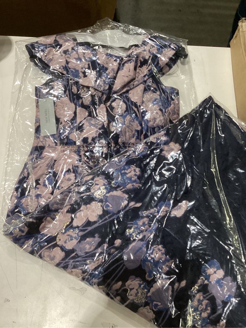 Condition photo showing New/Like New for Rickie freeman Terri Jon size 4 dress