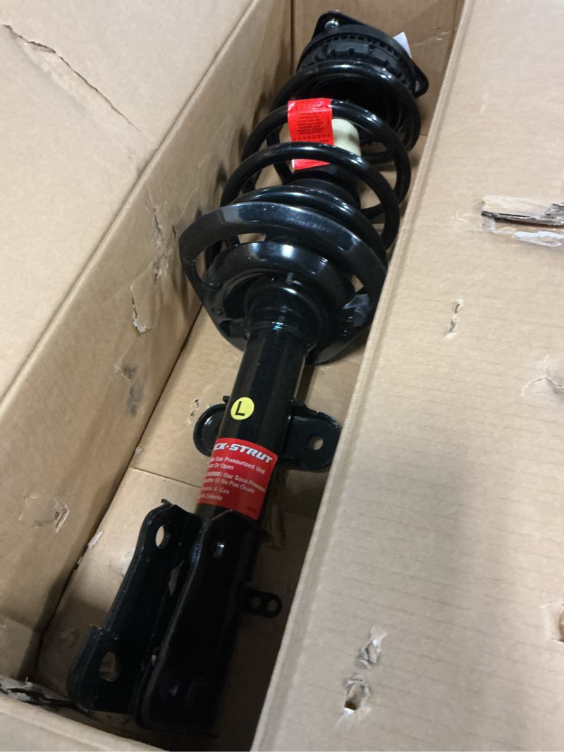 Condition photo showing Good Condition for monroe quick-strut 171128l suspension strut and coil spring assembly for dodge grand caravan